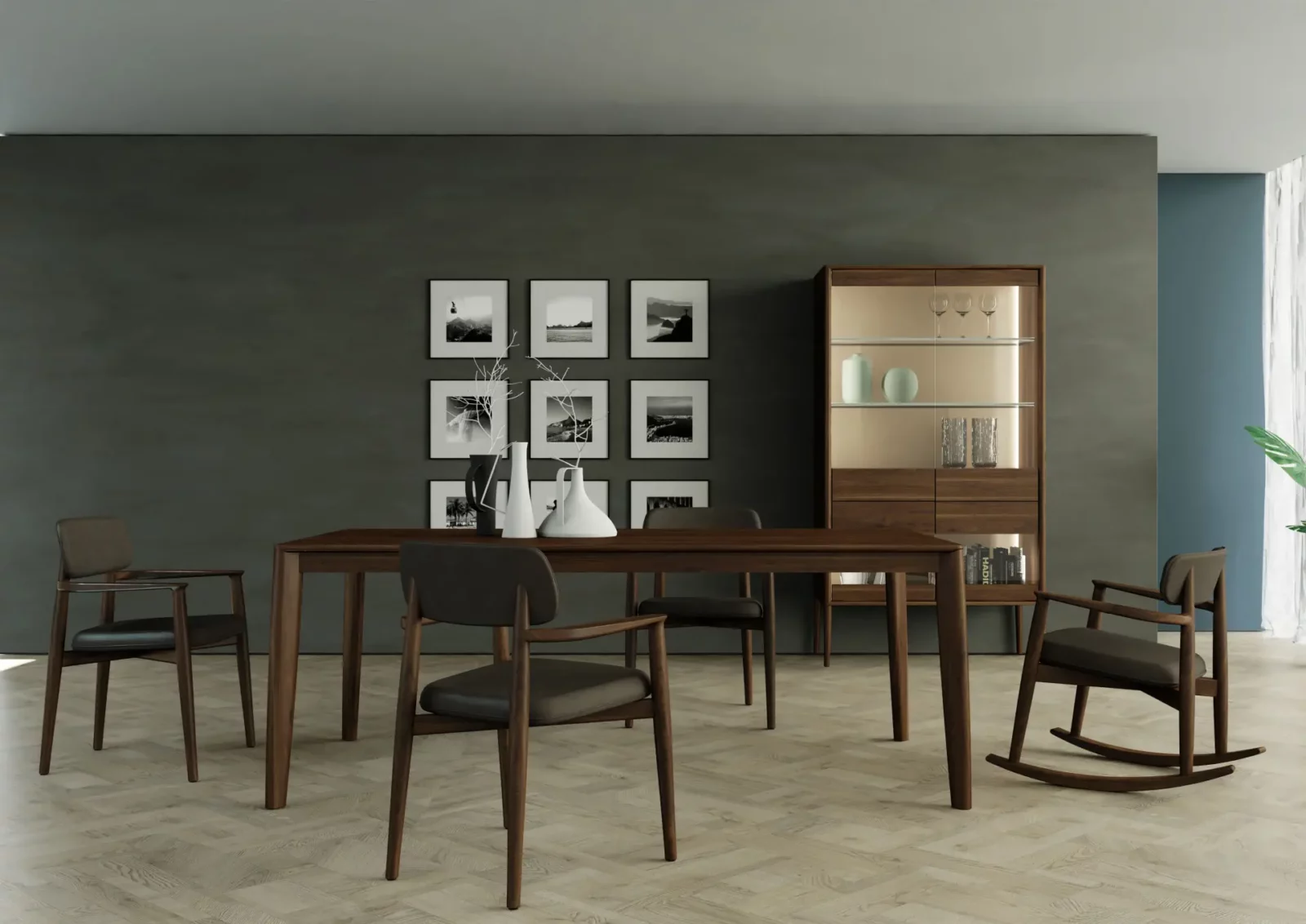 Anrei JUNA Essgruppe aus dunklem Holz mit Vitrine und Stühlen.