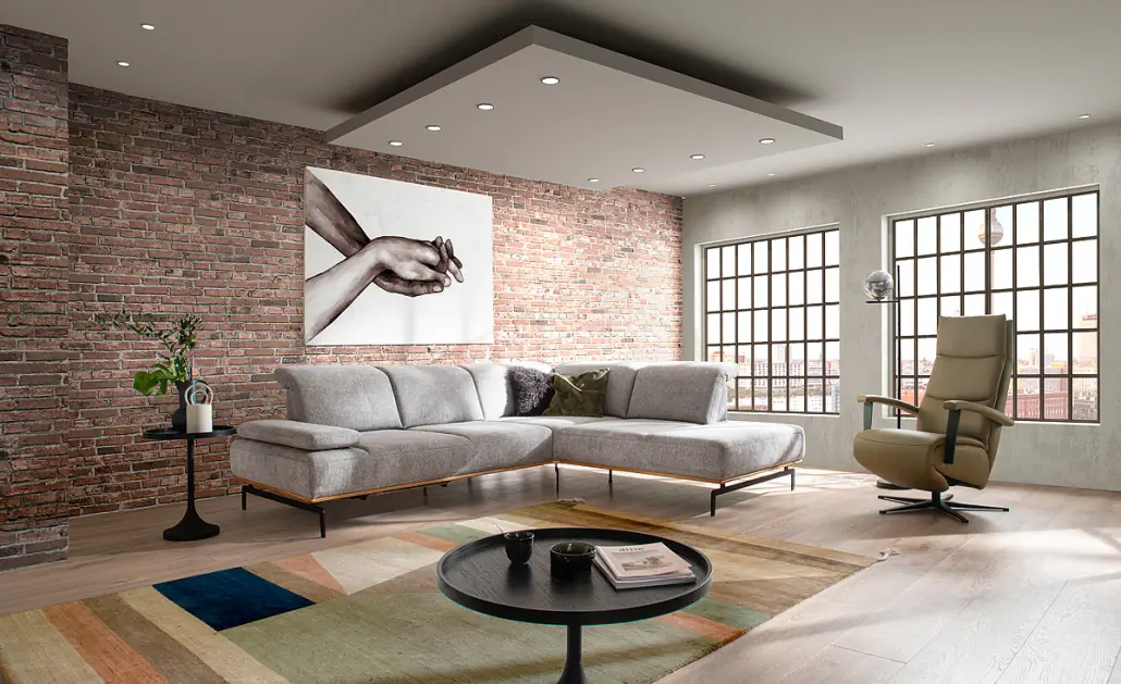 Activineo Bronson Ecksofa in grauem Stoff mit geöltem Eichenholzrahmen.