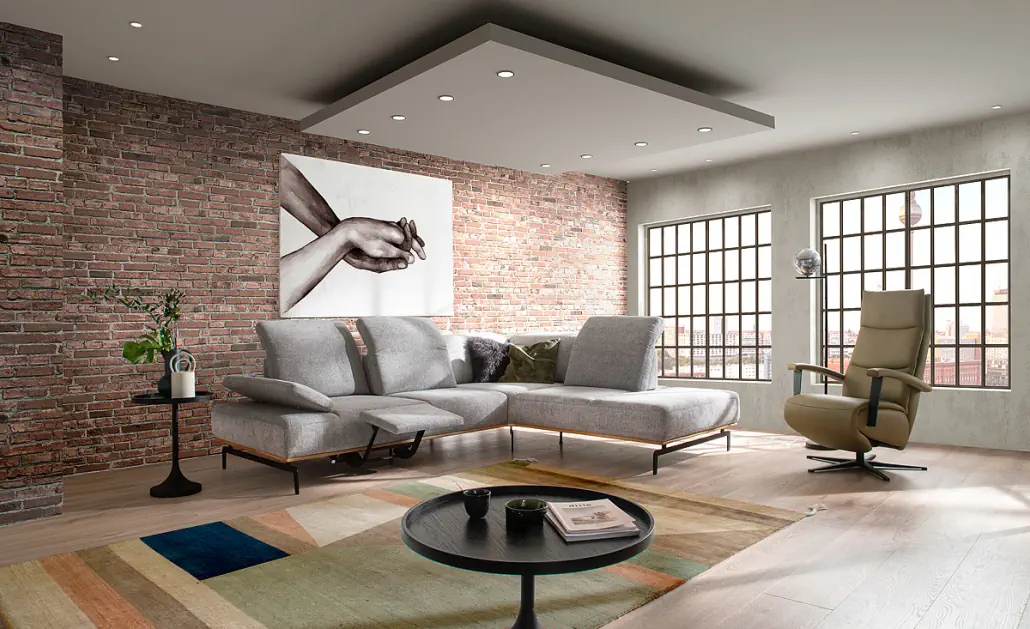 Activineo Bronson Sofa mit elektrischer Fußklappe, Kopfteil- und Sitztiefenverstellung in Grau.