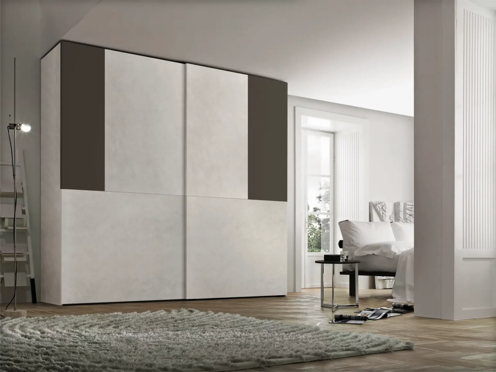 Muro Bello Atlantico Kleiderschrank mit Schiebetüren in Weiß und Dunkelgrau.