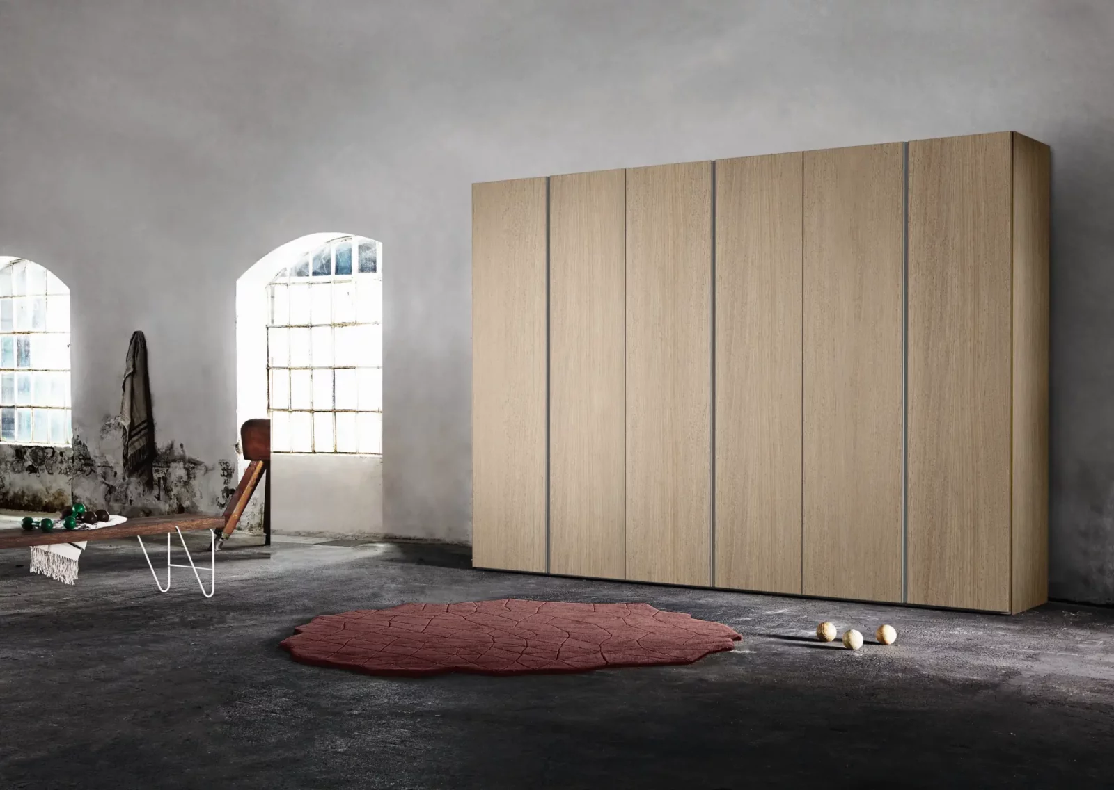 Muro Bello Atlantico Kleiderschrank in heller Holzoptik mit minimalistischen Türen.
