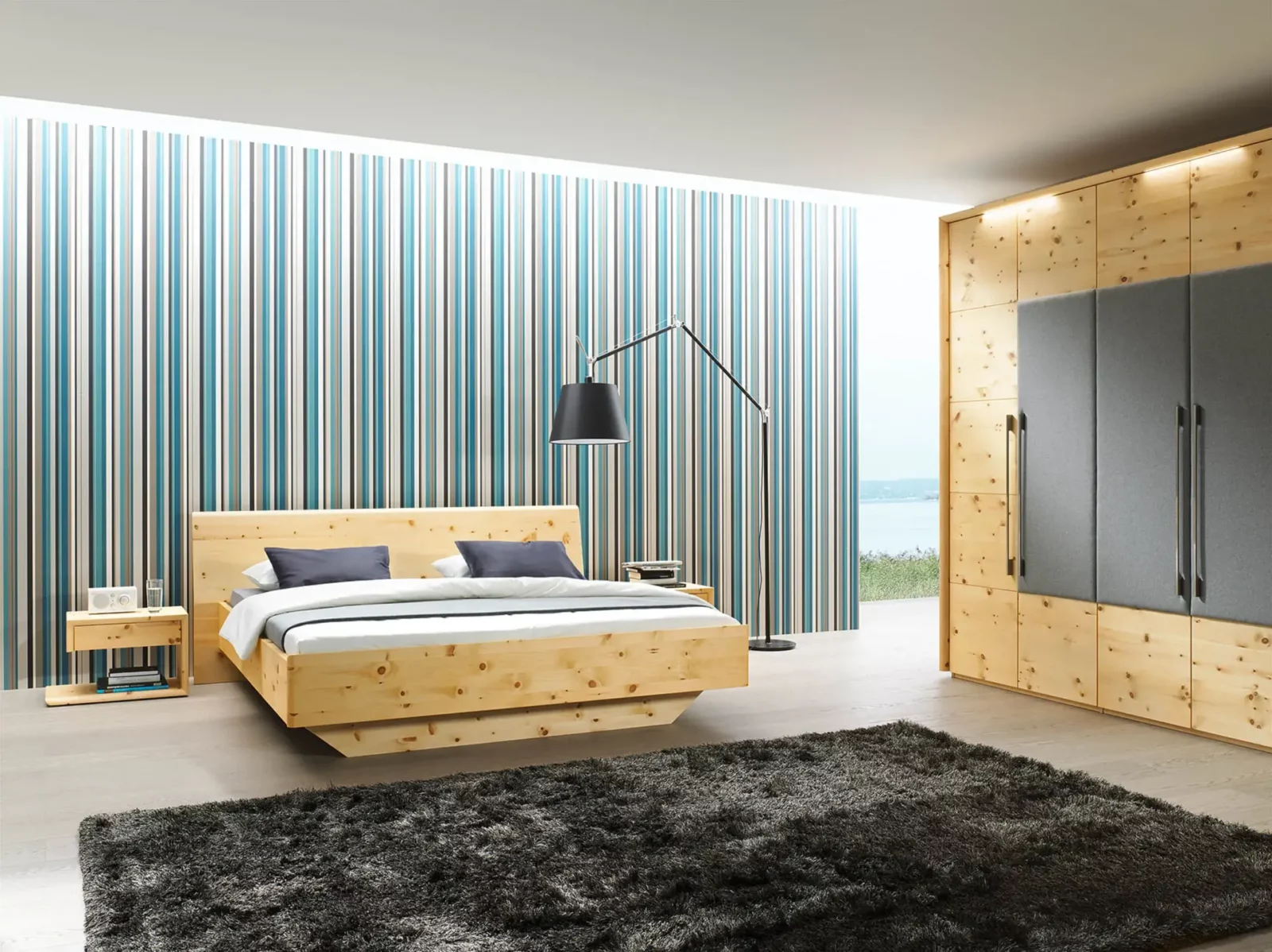 Anrei Tesso Schlafzimmermöbel aus hellem Holz mit Bett, Schrank und Nachttisch.