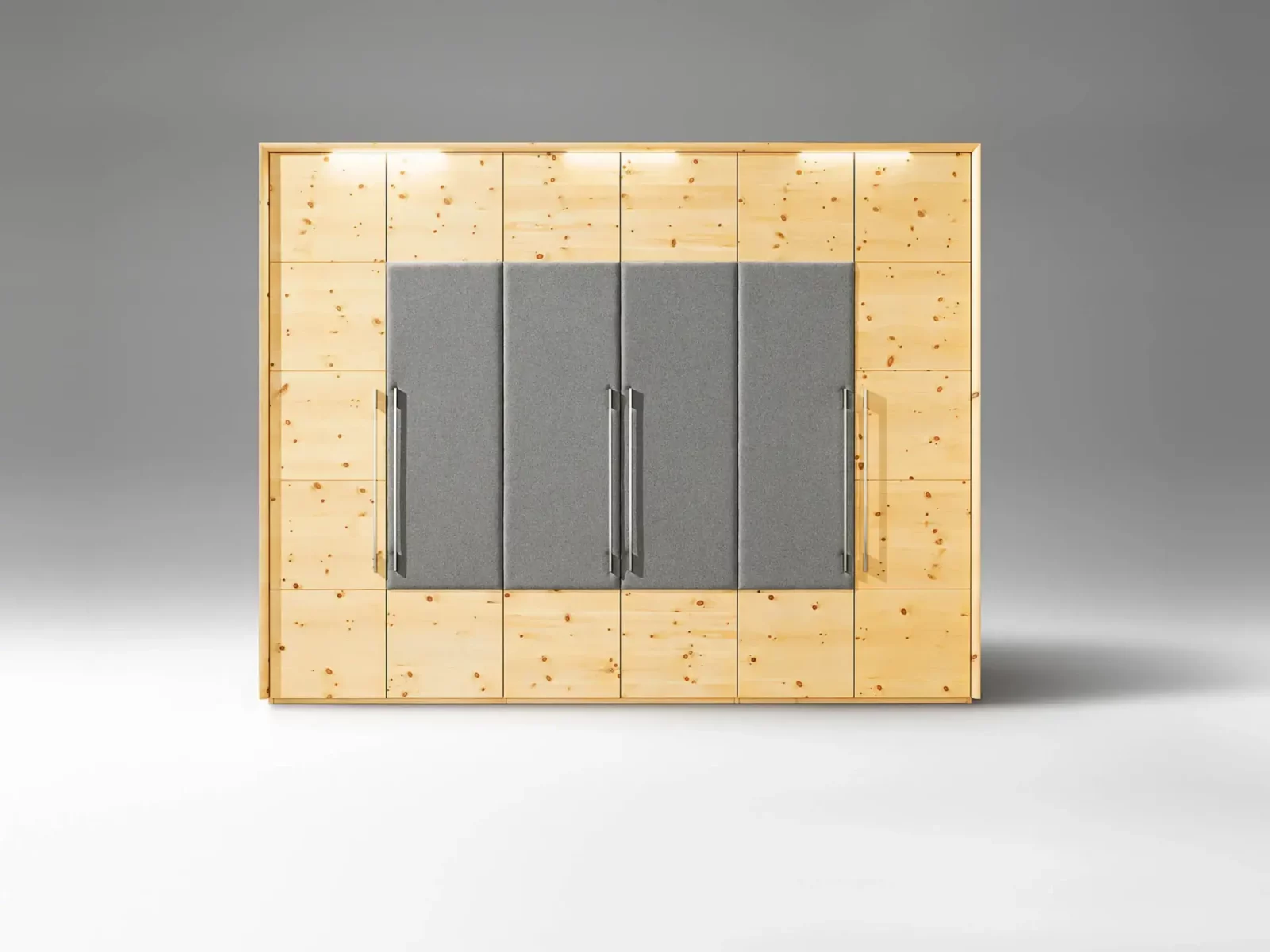 Anrei Tesso Kleiderschrank aus hellem Holz mit grauen Polsterfronten.