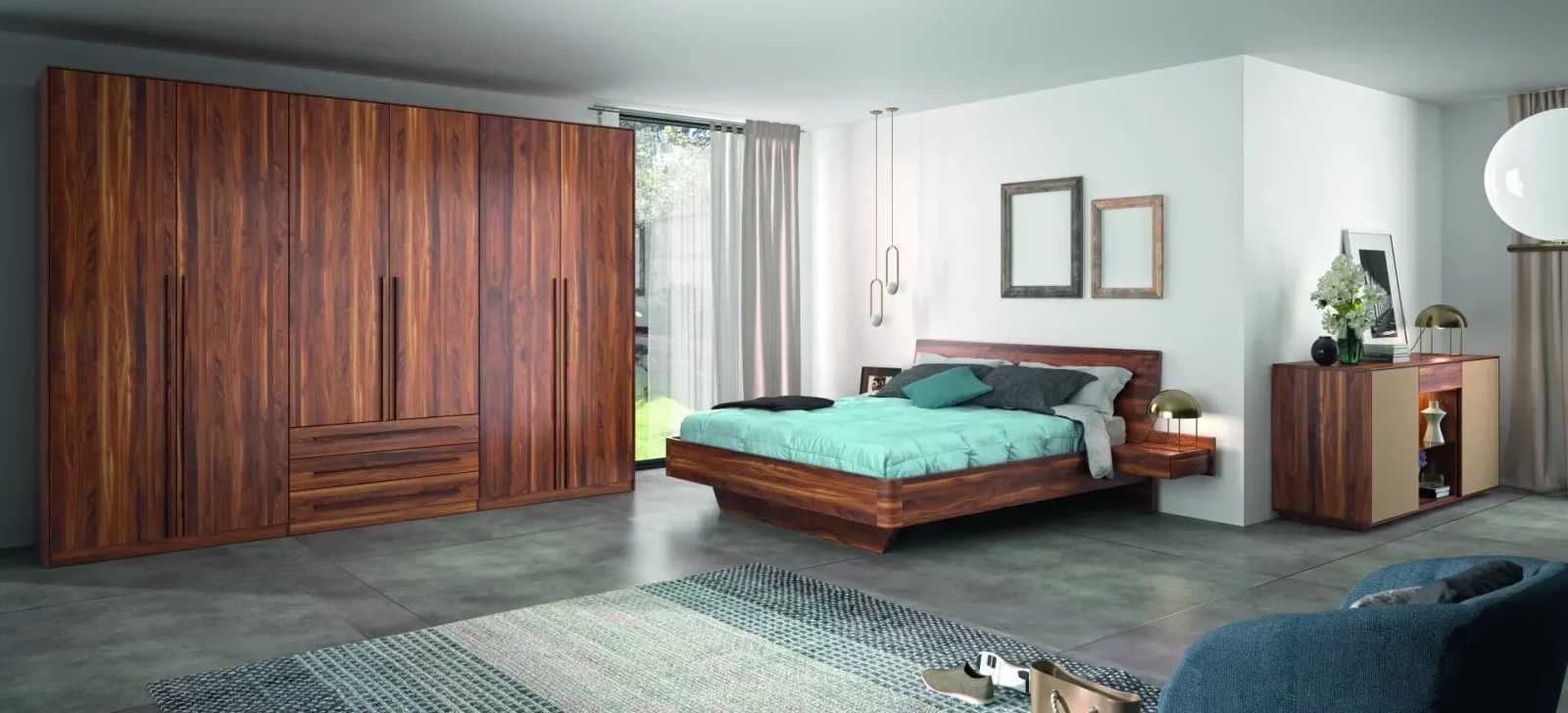 Holzschmiede Schlafen Jaso10 Schlafzimmermöbel aus dunklem Holz mit klaren Linien.