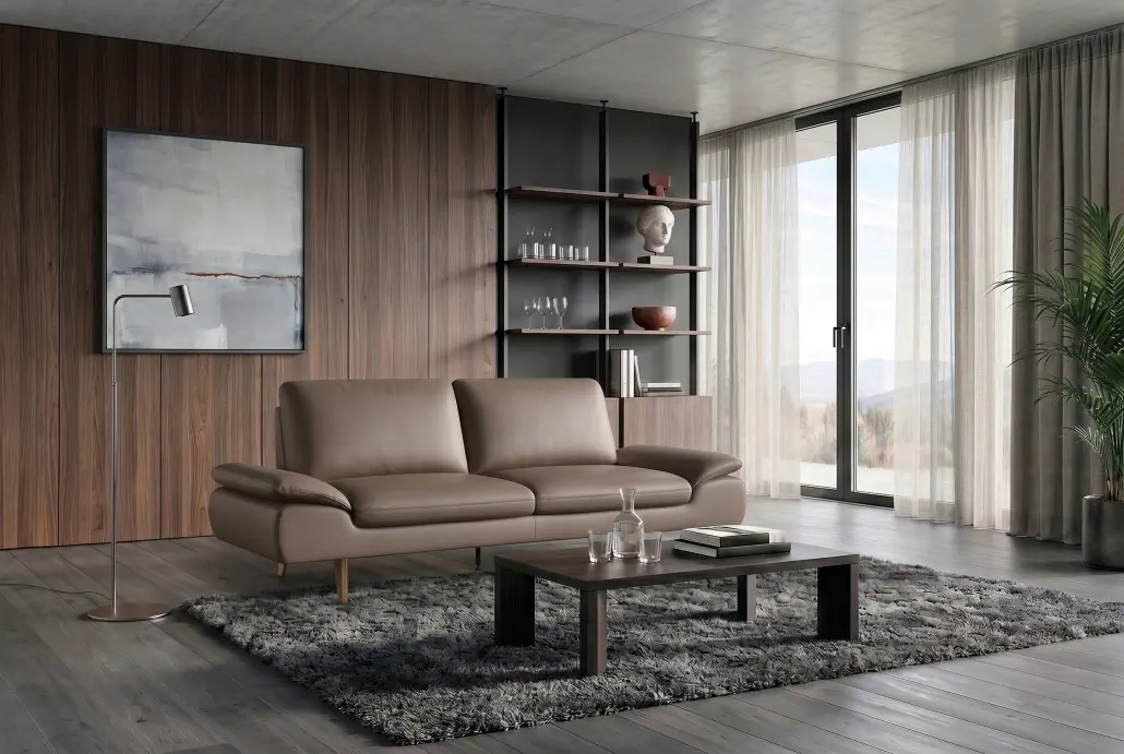 Activineo Brunetti 3er Sofa in Braun mit Holzfüßen vor Holzvertäfelung.
